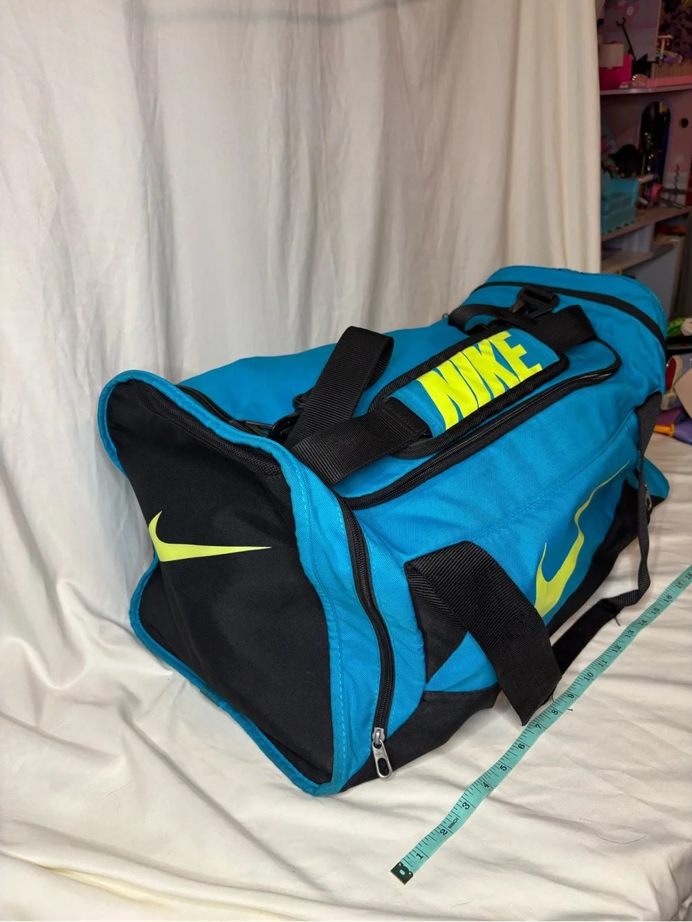 Nike Men’s Blue & Neon Yellow Duffel Bag With Side Pockets and Shoulder Strap